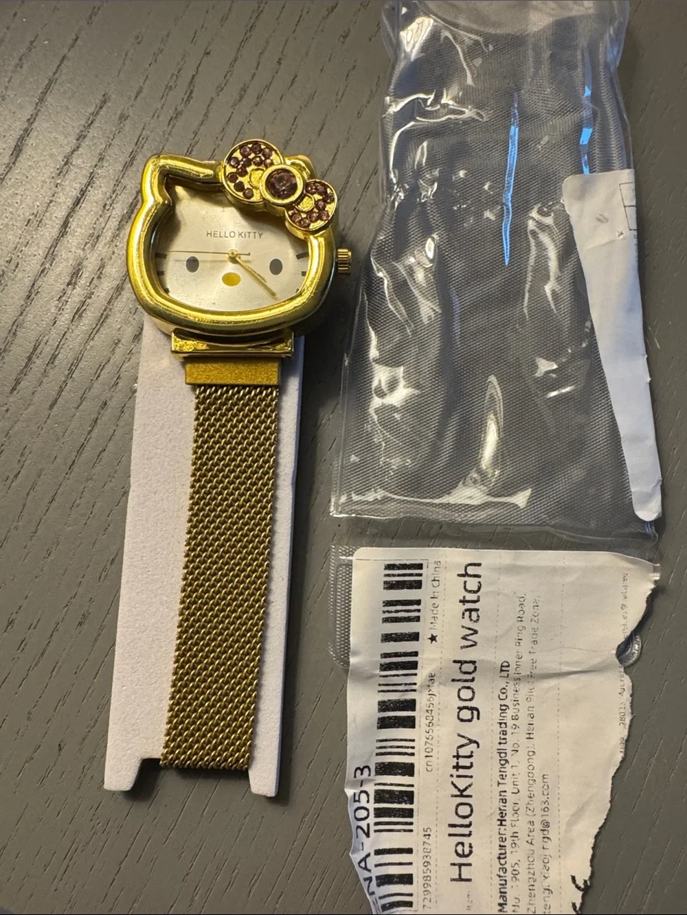 Hello Kitty Gold Tone Mesh Bracelet Watch with Crystal Bow
